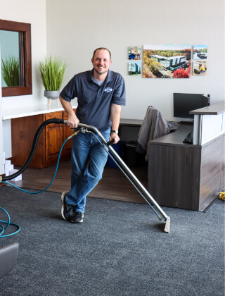 smiling office carpet cleaning staff